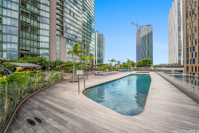 view of pool featuring a patio