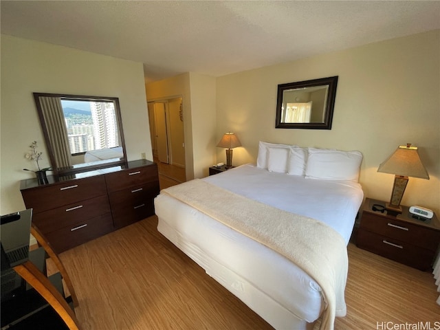 bedroom featuring hardwood / wood-style floors