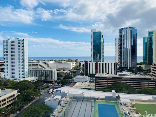 property's view of city featuring a water view