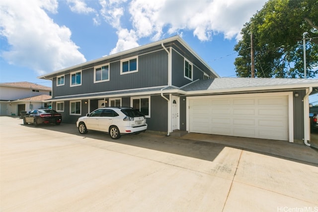 view of property featuring a garage