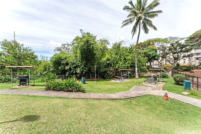 view of home's community featuring a lawn