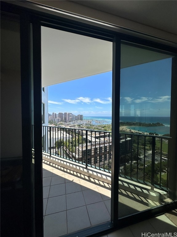 balcony featuring a water view