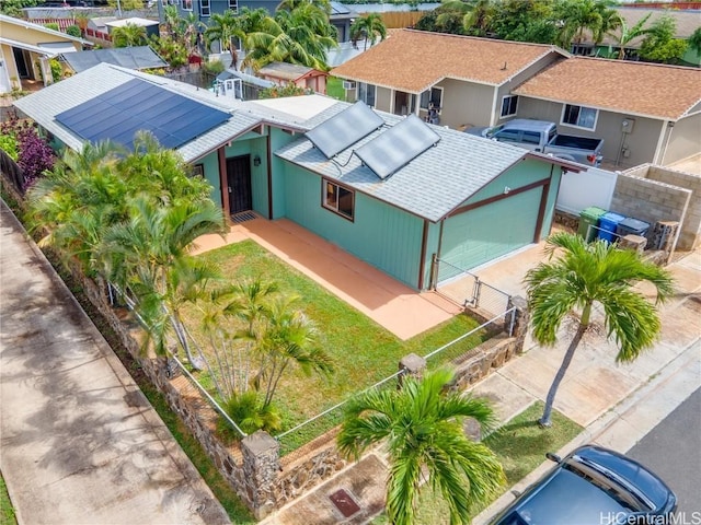 birds eye view of property with a residential view