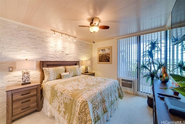 bedroom featuring ceiling fan, light colored carpet, wood ceiling, and track lighting