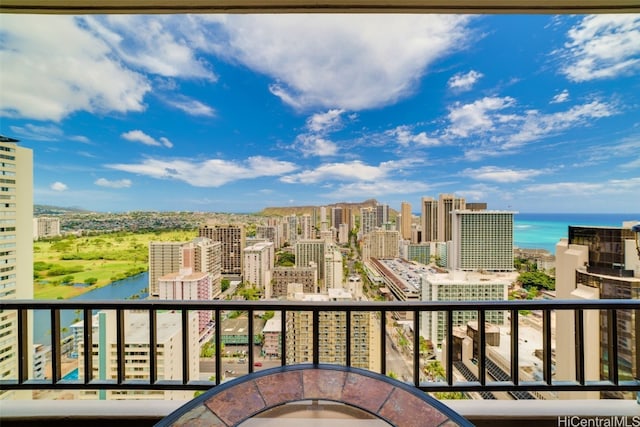 balcony featuring a water view