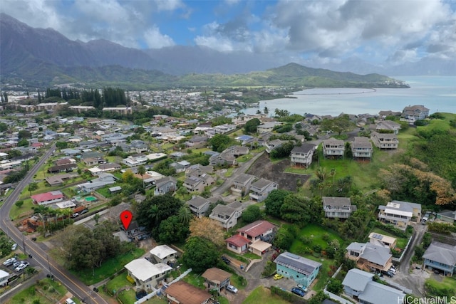 aerial view featuring a water and mountain view