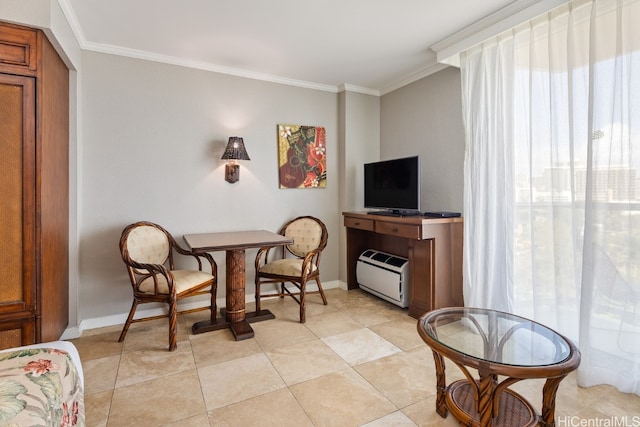 sitting room featuring ornamental molding and light tile patterned flooring