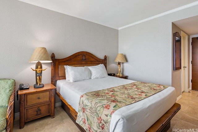 bedroom featuring crown molding