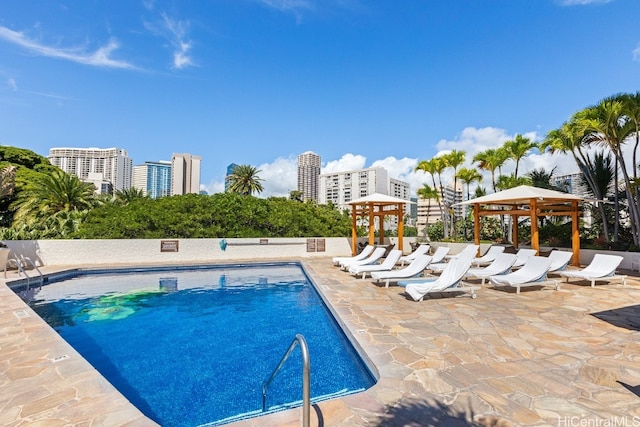 view of pool featuring a gazebo and a patio area