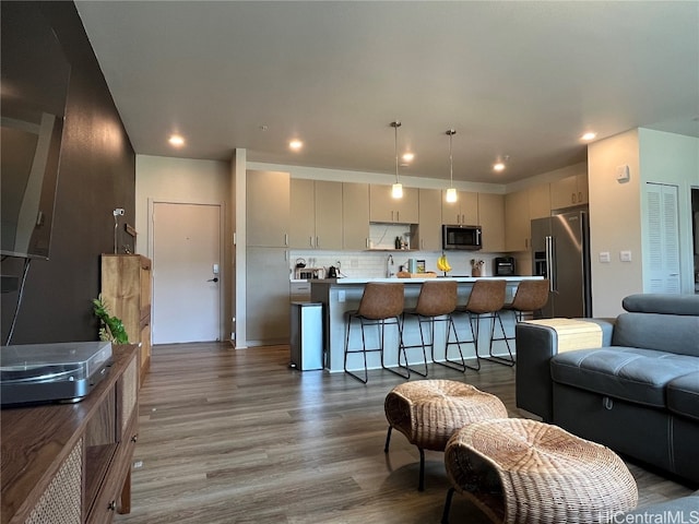 living room with wood-type flooring