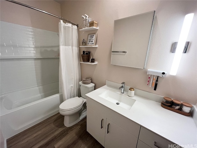 full bathroom featuring vanity, toilet, hardwood / wood-style flooring, and shower / bath combination with curtain