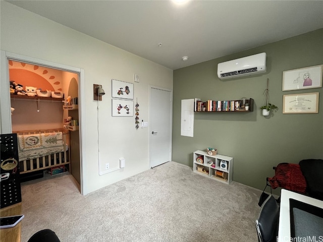 game room featuring a wall mounted AC and carpet