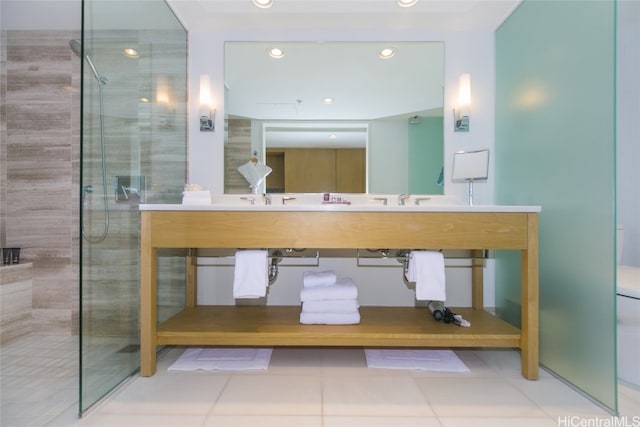 bathroom featuring vanity, tile patterned flooring, and an enclosed shower