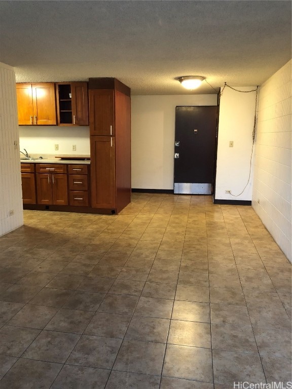 kitchen featuring a textured ceiling