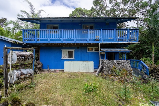 rear view of house with a deck