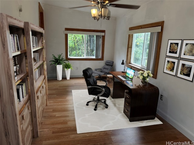 home office featuring ceiling fan and light hardwood / wood-style flooring