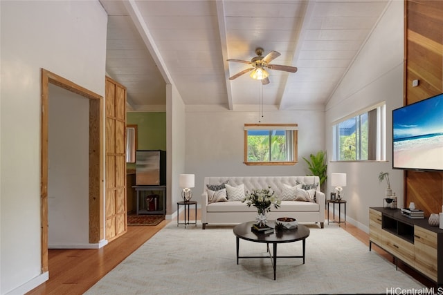 living room featuring vaulted ceiling with beams, ceiling fan, wood ceiling, and light hardwood / wood-style flooring