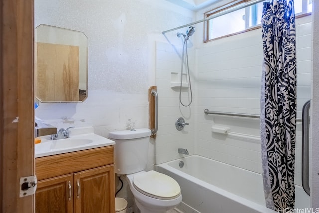 full bathroom featuring vanity, shower / bath combination with curtain, and toilet