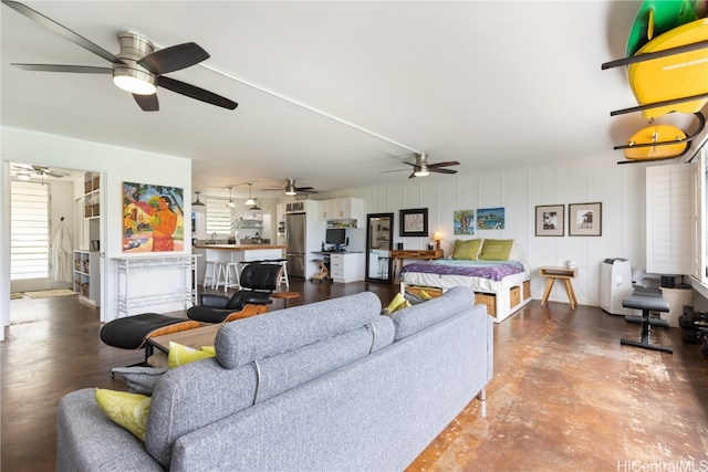 living room featuring concrete floors