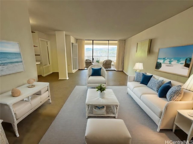 living room with floor to ceiling windows