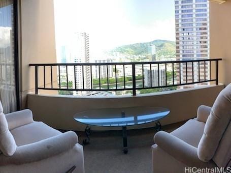balcony featuring a view of city