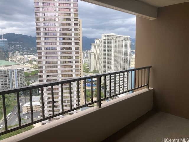 balcony featuring a mountain view