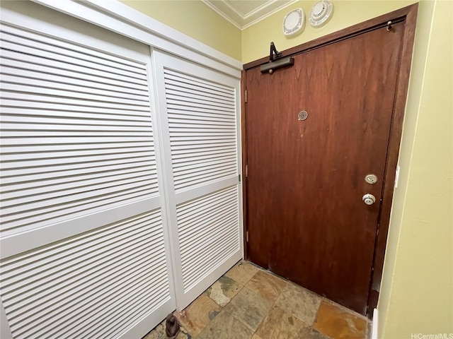 2215 Aloha Dr Unit 701, Honolulu, HI 96815 - entryway featuring ornamental molding and light stone finish floors