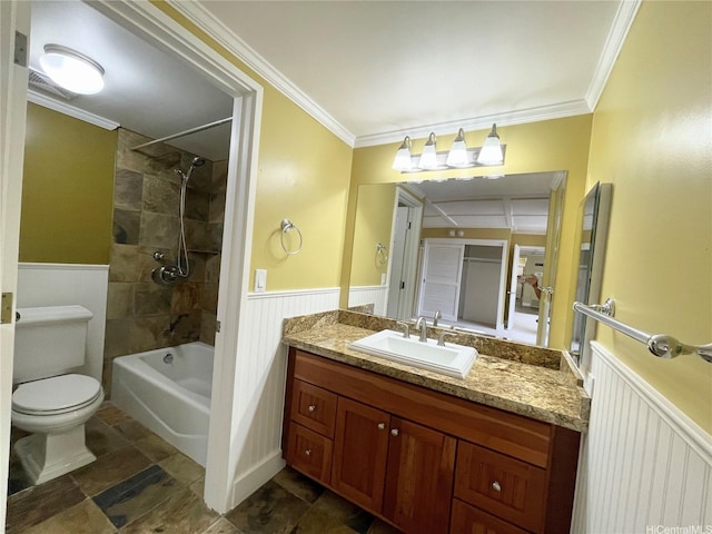 2215 Aloha Dr Unit 701, Honolulu, HI 96815 - bathroom featuring a wainscoted wall, vanity, toilet, stone finish floors, and crown molding
