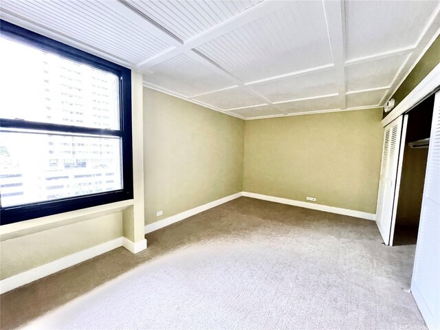 2215 Aloha Dr Unit 701, Honolulu, HI 96815 - unfurnished bedroom with carpet floors, baseboards, and a closet