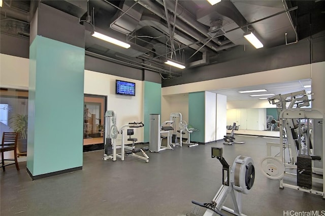 gym with a high ceiling