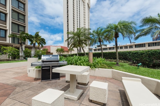 surrounding community featuring a patio