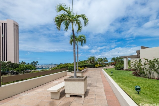 view of patio with an outdoor fire pit