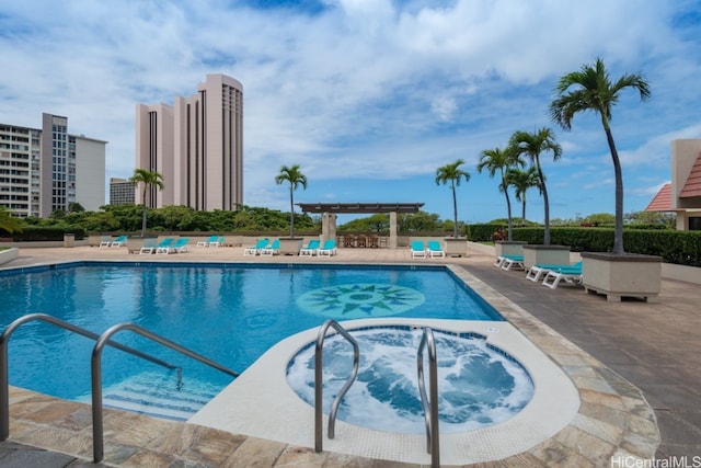 view of pool featuring a patio area