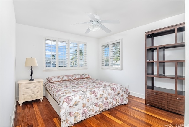 bedroom with ceiling fan and hardwood / wood-style floors