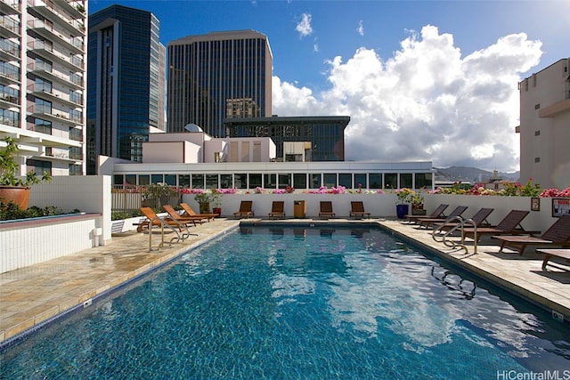 view of pool featuring a patio area