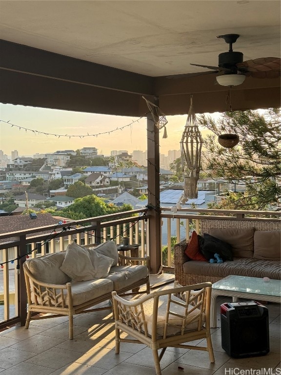 exterior space with an outdoor living space and ceiling fan