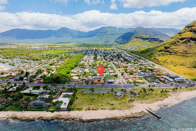 bird's eye view featuring a water and mountain view