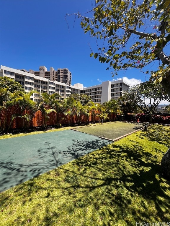 view of home's community with a lawn