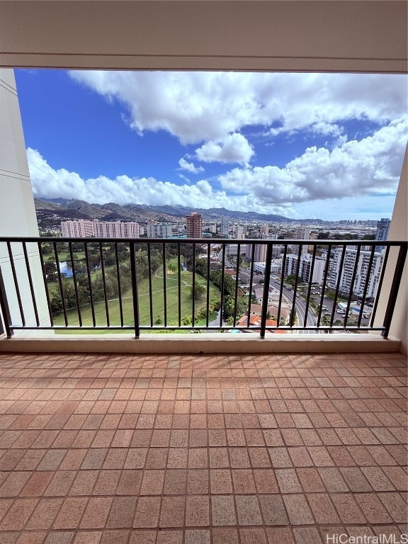 balcony featuring a mountain view