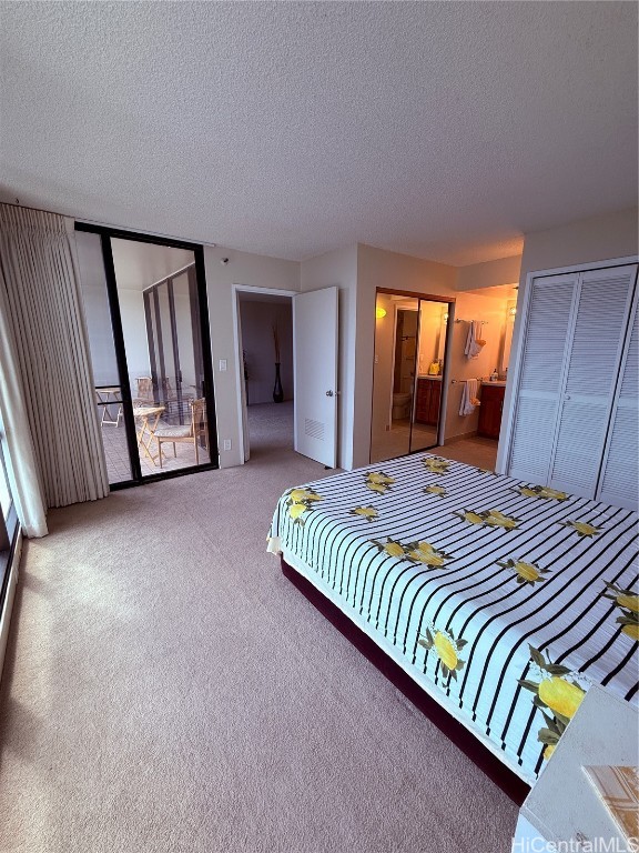 unfurnished bedroom with carpet and a textured ceiling