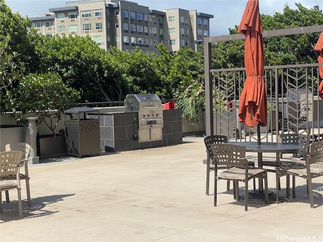 view of patio / terrace featuring exterior kitchen and area for grilling