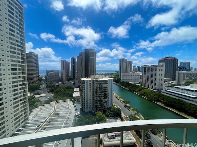 property's view of city featuring a water view