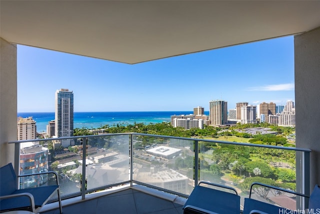 balcony featuring a water view