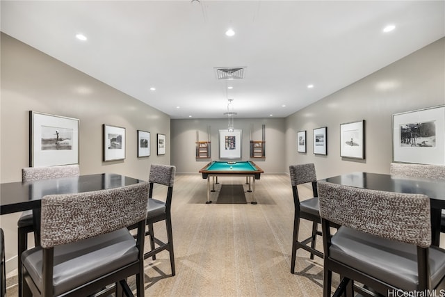 game room with pool table and light colored carpet