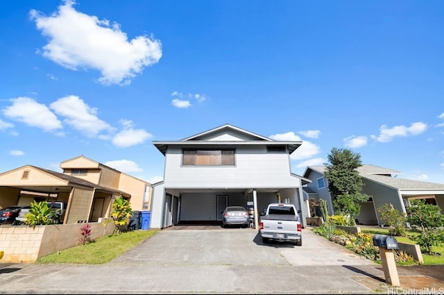 view of front of home featuring a carport