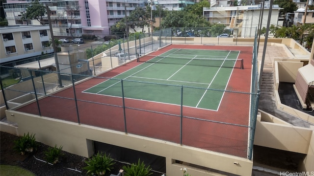 view of tennis court featuring basketball court