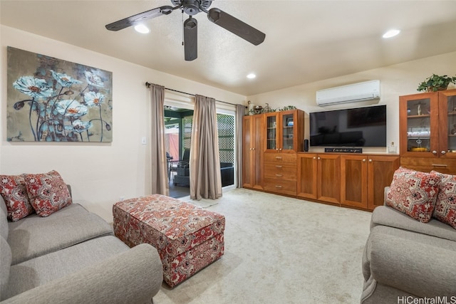 living room with ceiling fan, an AC wall unit, and light carpet