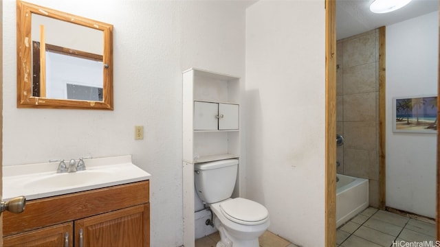 full bathroom with tile patterned floors, vanity, toilet, and shower / washtub combination