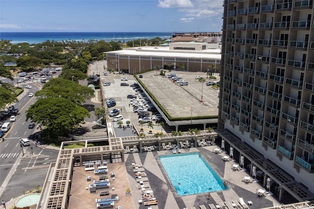 birds eye view of property with a water view