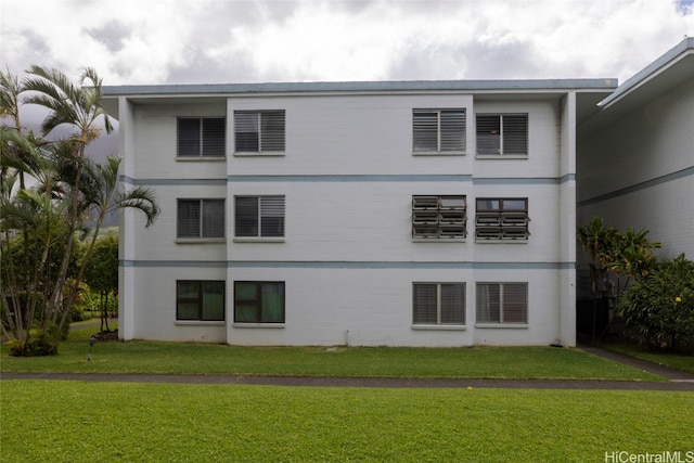 exterior space with a lawn